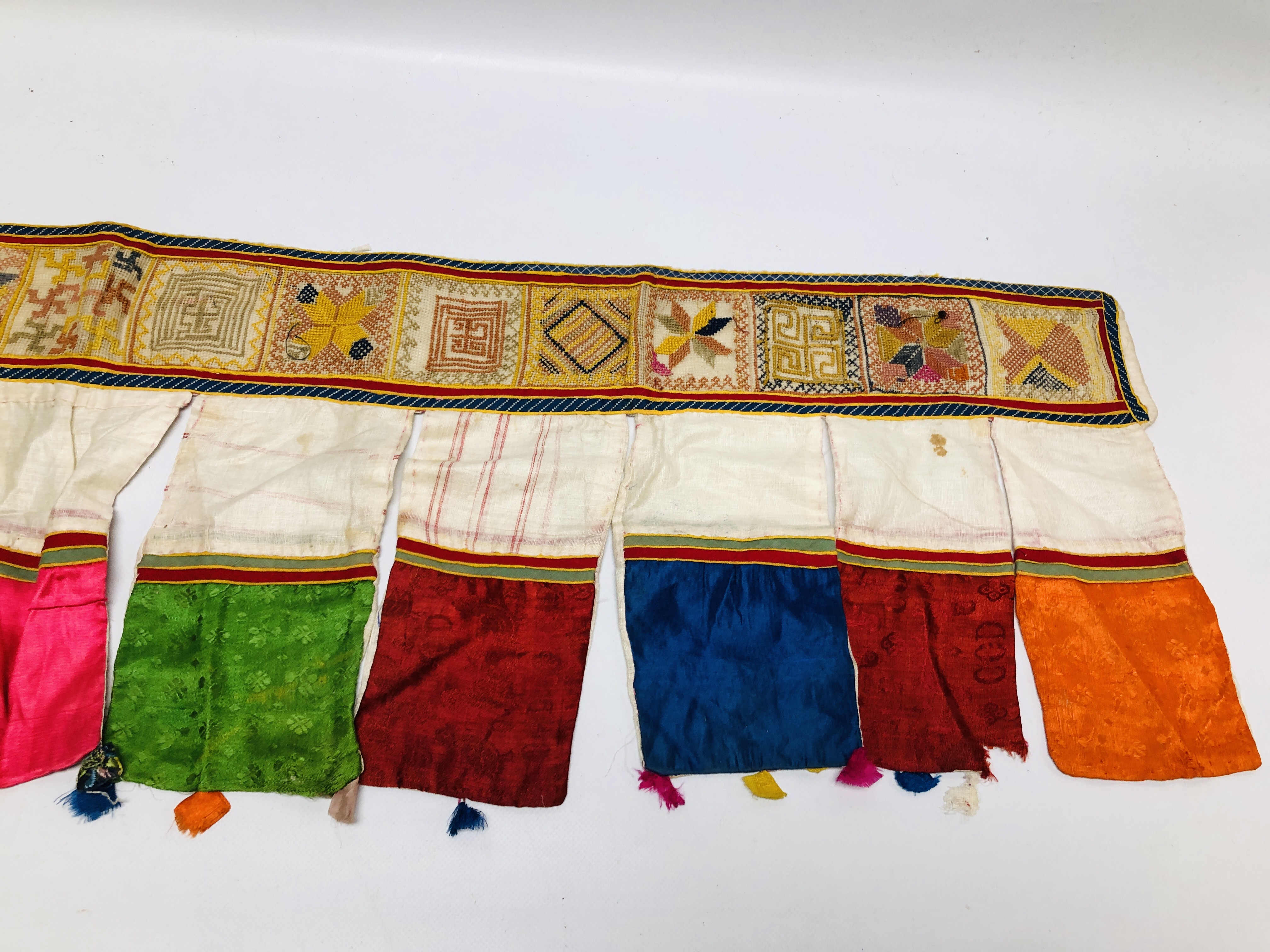 A HANDMADE ETHNIC TRIBAL SILK AND EMBROIDERED DOOR / WINDOW HANGING. - Image 4 of 5