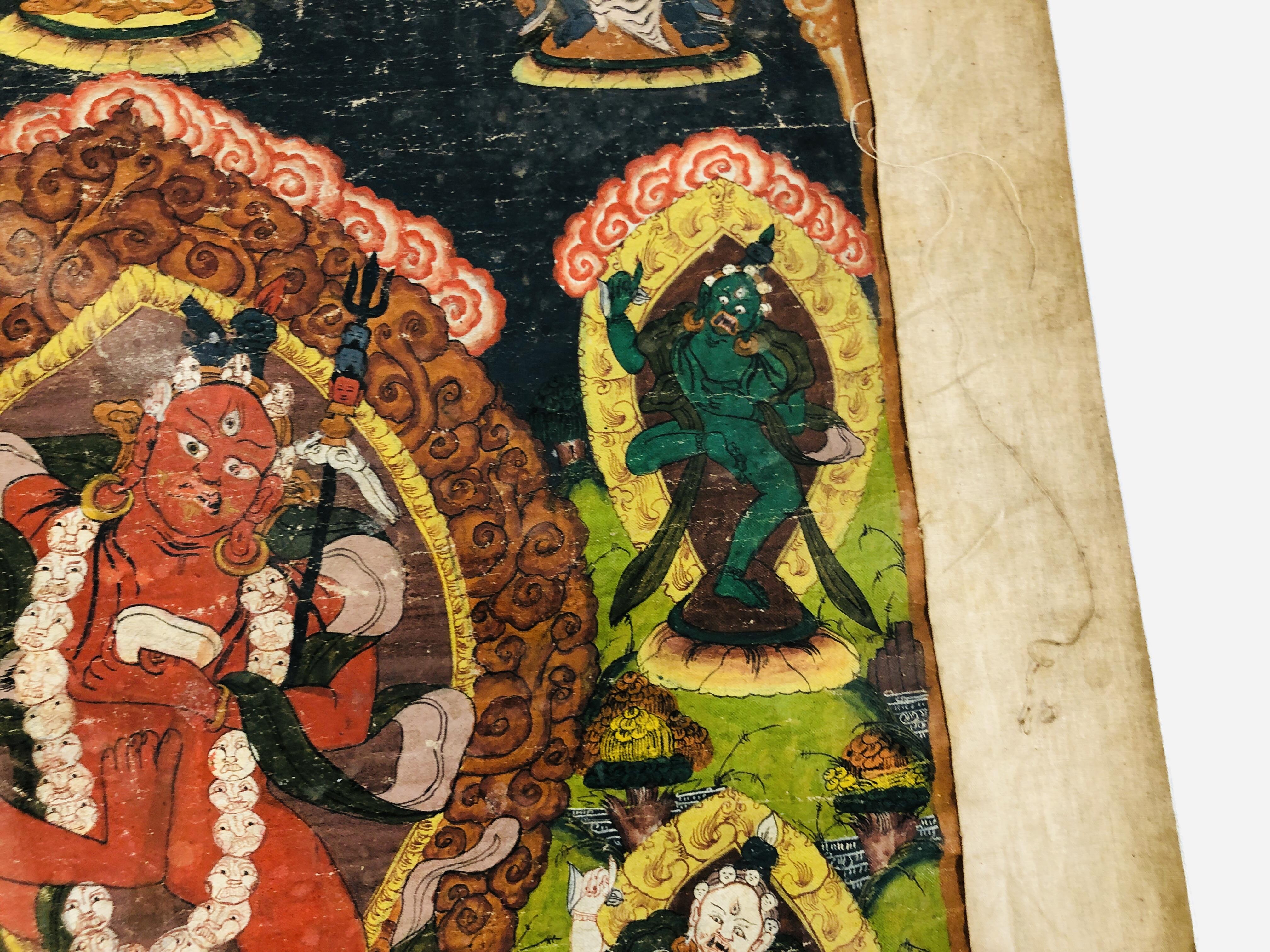 A TIBETAN THANGKA, DEPICTING CENTRAL DEITY SURROUNDED BY FURTHER FIGURES, PROBABLY YAMARAJA, - Image 11 of 17