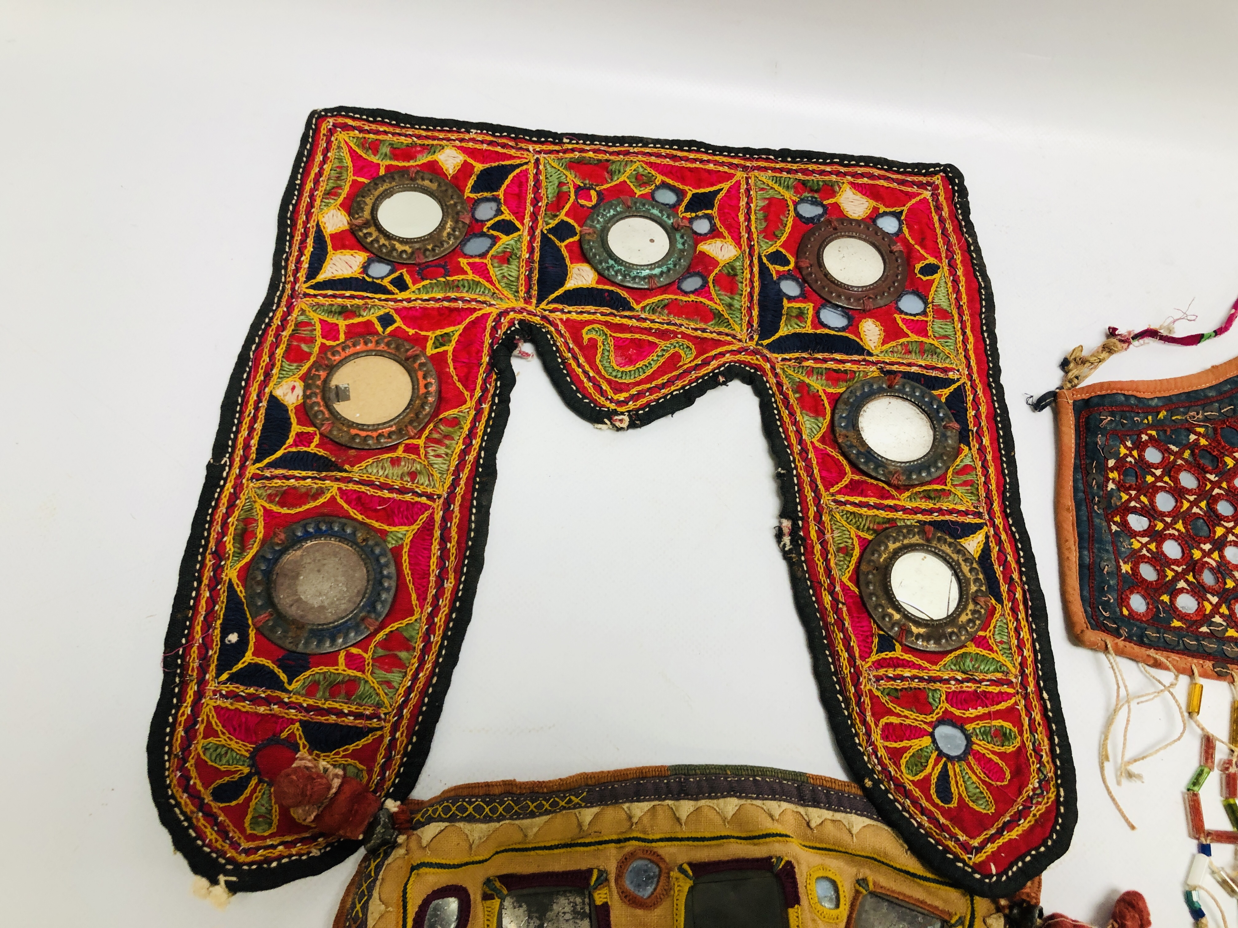 A COLLECTION OF EASTERN AND ASIAN TRIBAL ART FACE MASKS TO INCLUDE SHISHA AND NEEDLEWORK EXAMPLES. - Image 5 of 8