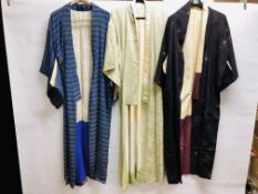 A GROUP OF THREE VINTAGE JAPANESE "KIMONOS" TO INCLUDE PRINTED SILK EXAMPLES