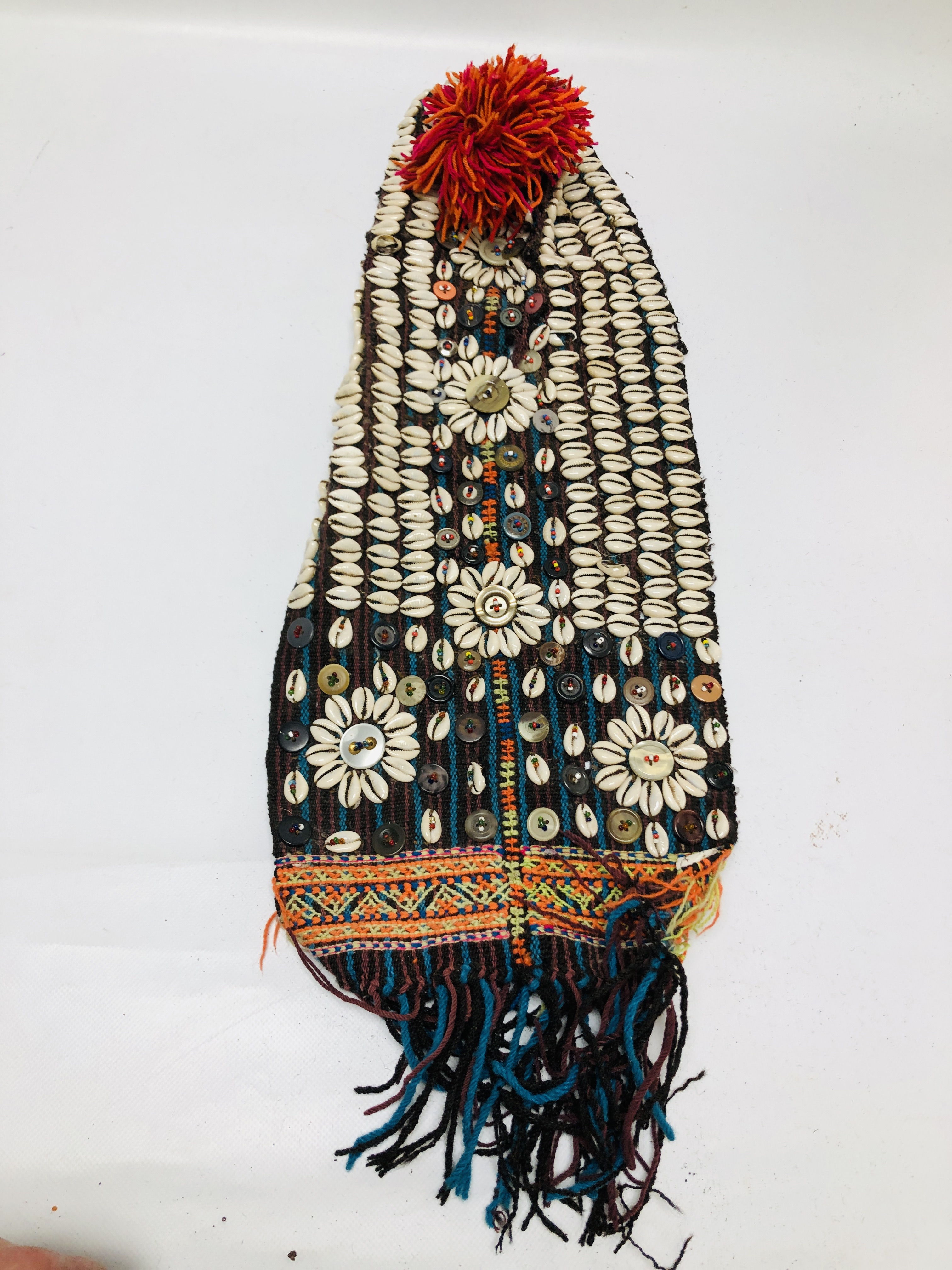 A GROUP OF 5 ETHNIC AND TRIBAL HATS / HEAD COVERINGS TO INCLUDE AN ELABORATELY EMBROIDERED ASIAN - Image 11 of 12