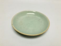 A CHINESE CELADON DISH, PROBABLY C18TH (RIM CHIP) DIA. 18CM.