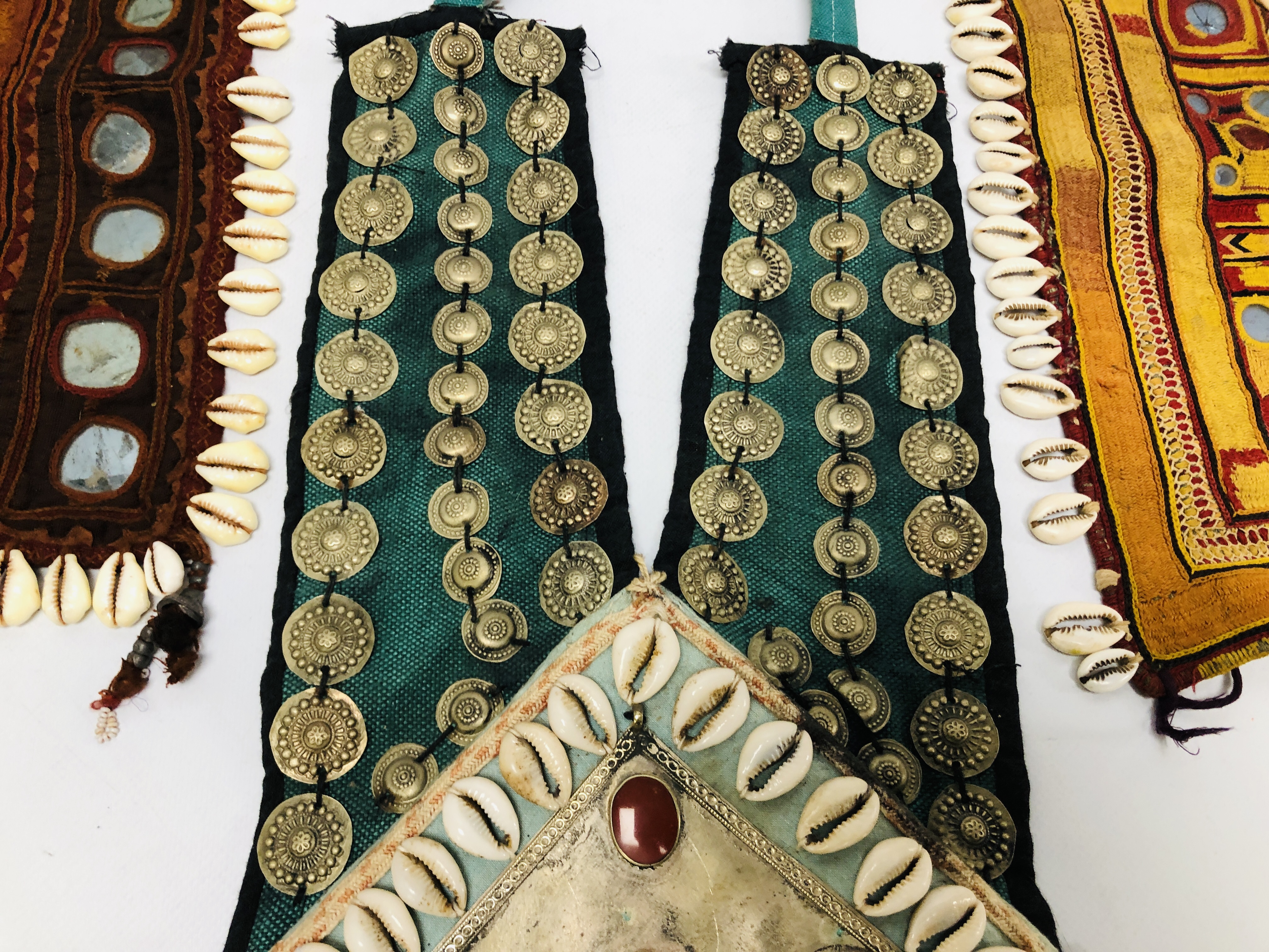 A GROUP OF FIVE VARIOUS AFGHAN TEXTILE PIECES APPLIED WITH COWRIE SHELLS AND OTHER DECORATION - Image 9 of 10
