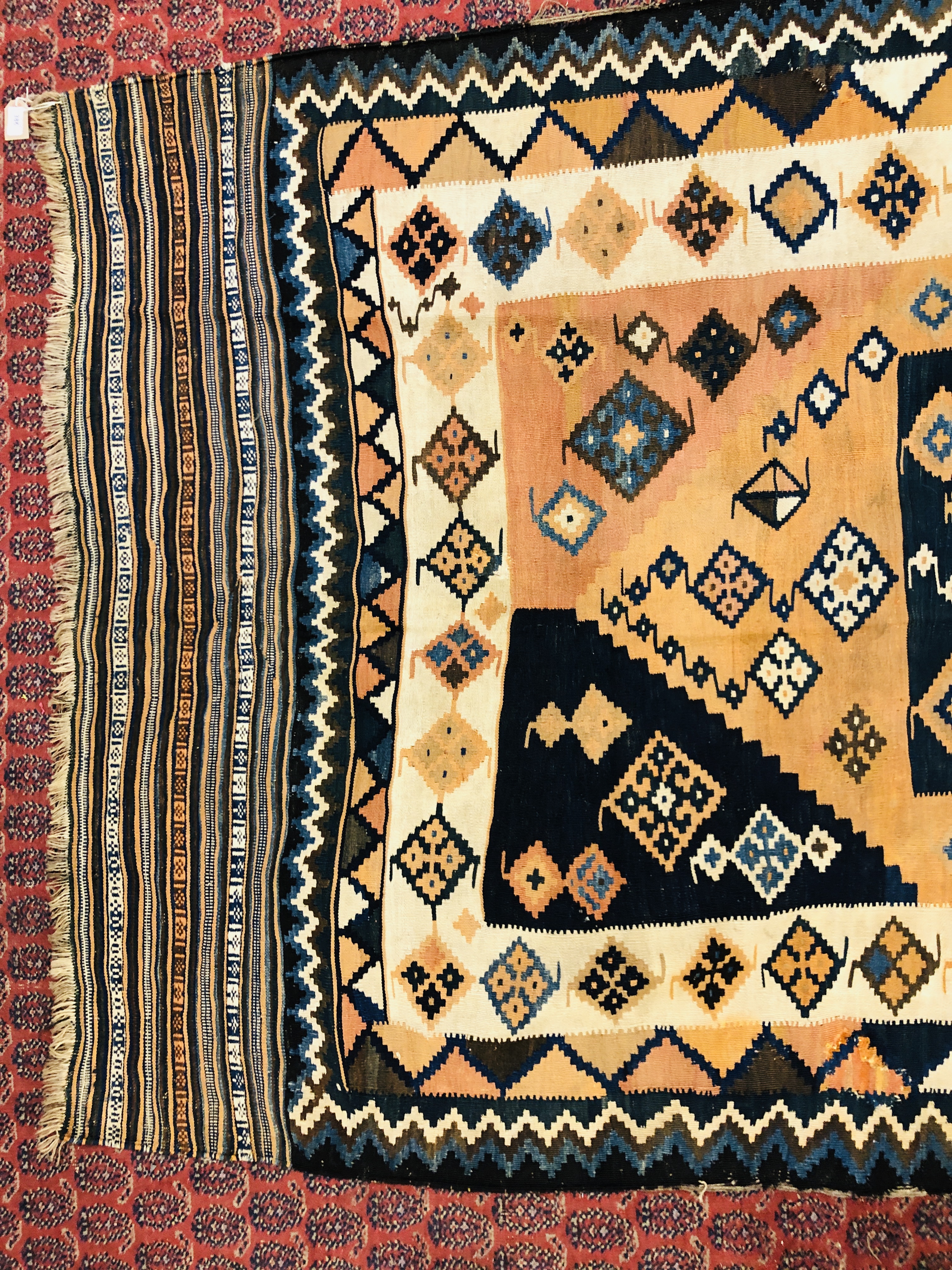 PERSIAN KELIM WITH CENTRAL SQUARE MOTIF ON A RUST BACKGROUND WOVEN WITH HOOKED LOZENGES LENGTH - Image 2 of 9