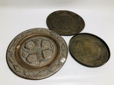 A GROUP OF MIDDLE EASTERN AND ASIAN METAL WARE COMPRISING OF TWO CHARGERS OF PIERCED DESIGN AND A