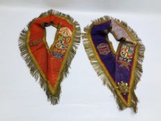 TWO ANTIQUE SILK SASHES WITH A WOVEN GILT FRINGE.