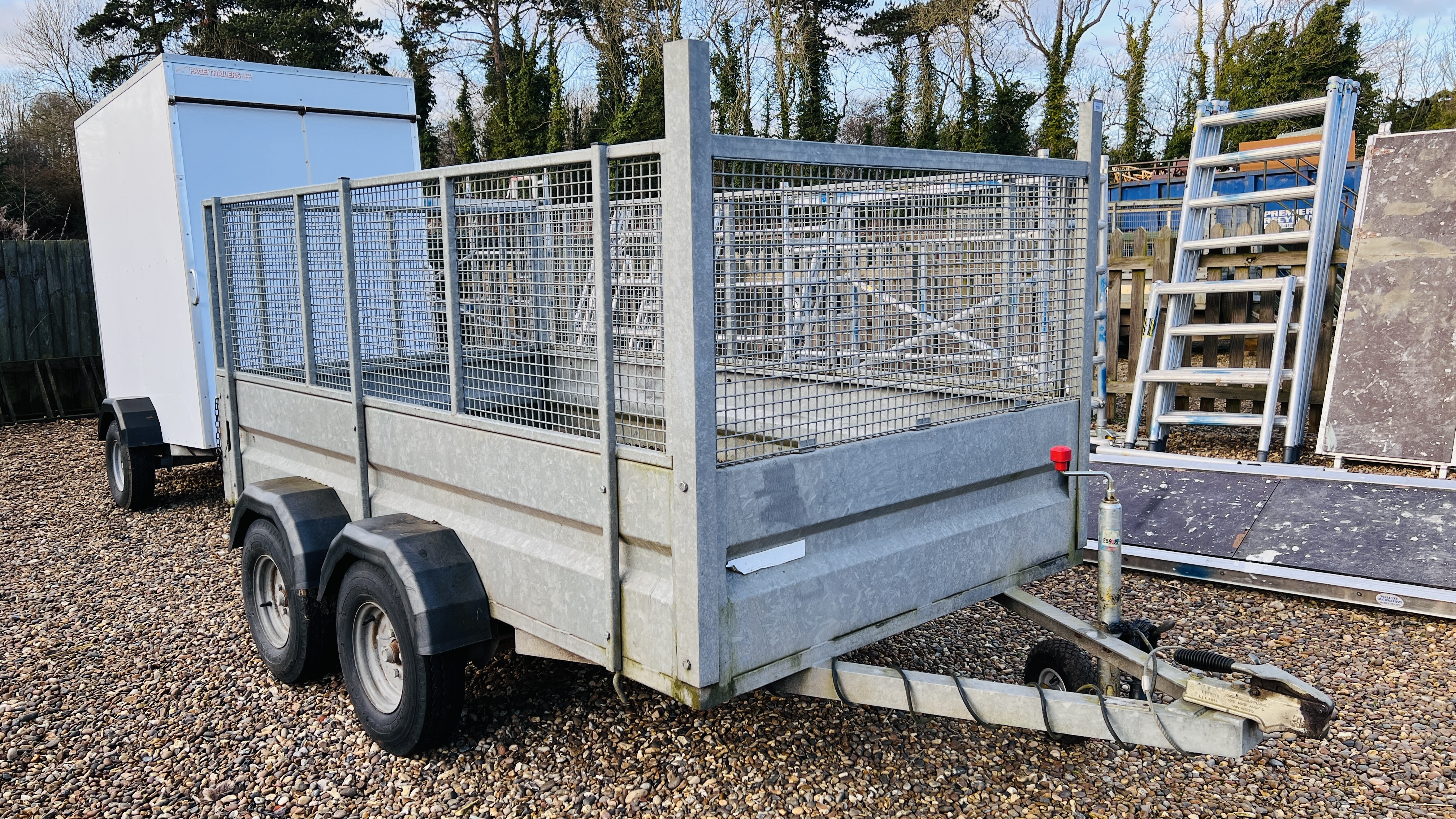 A PAGE TRAILERS TWIN AXLE GALVANISED CAR TRAILER WITH CAGE TOP, 8FT 7INCH X 4FT 7 INCH.