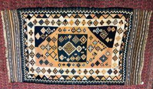 PERSIAN KELIM WITH CENTRAL SQUARE MOTIF ON A RUST BACKGROUND WOVEN WITH HOOKED LOZENGES LENGTH