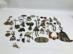 A BOX OF ASSORTED EASTERN STYLE JEWELLERY TO INCLUDE MANY WHITE METAL PENDANTS,