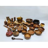 AN EXTENSIVE COLLECTION OF WOOD TURNED MAINLY "BERMUDA CEDAR" OBJECTS COMPRISING CANDLESTICKS AND