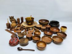 AN EXTENSIVE COLLECTION OF WOOD TURNED MAINLY "BERMUDA CEDAR" OBJECTS COMPRISING CANDLESTICKS AND