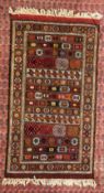 LATE C20TH. FLAT WEAVE RUG 102CM. X 195CM.