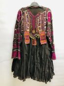 AN AFGHAN EMBROIDERED DRESS WITH EMBELLISHED BUTTON DETAIL AND BEADED PANELS