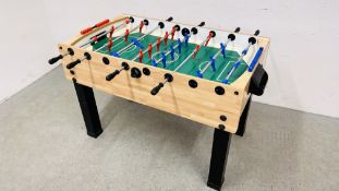 A MODERN TABLE FOOTBALL GAME W 74CM X D 130CM X H 87CM.