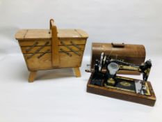 A VINTAGE SINGER SEWING MACHINE 79122550 ALONG WITH A HARDWOOD SEWING BOX WITH 3 SECTIONAL PULL OUT