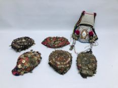 A GROUP OF SIX EASTERN AND ASIAN WOVEN AND EMBROIDERED HATS WITH EMBELLISHED DETAIL