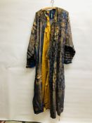 A VINTAGE CHINESE ROBE, ON A BLUE FIELD EMBROIDERED WITH GILT THREADED DRAGONS,