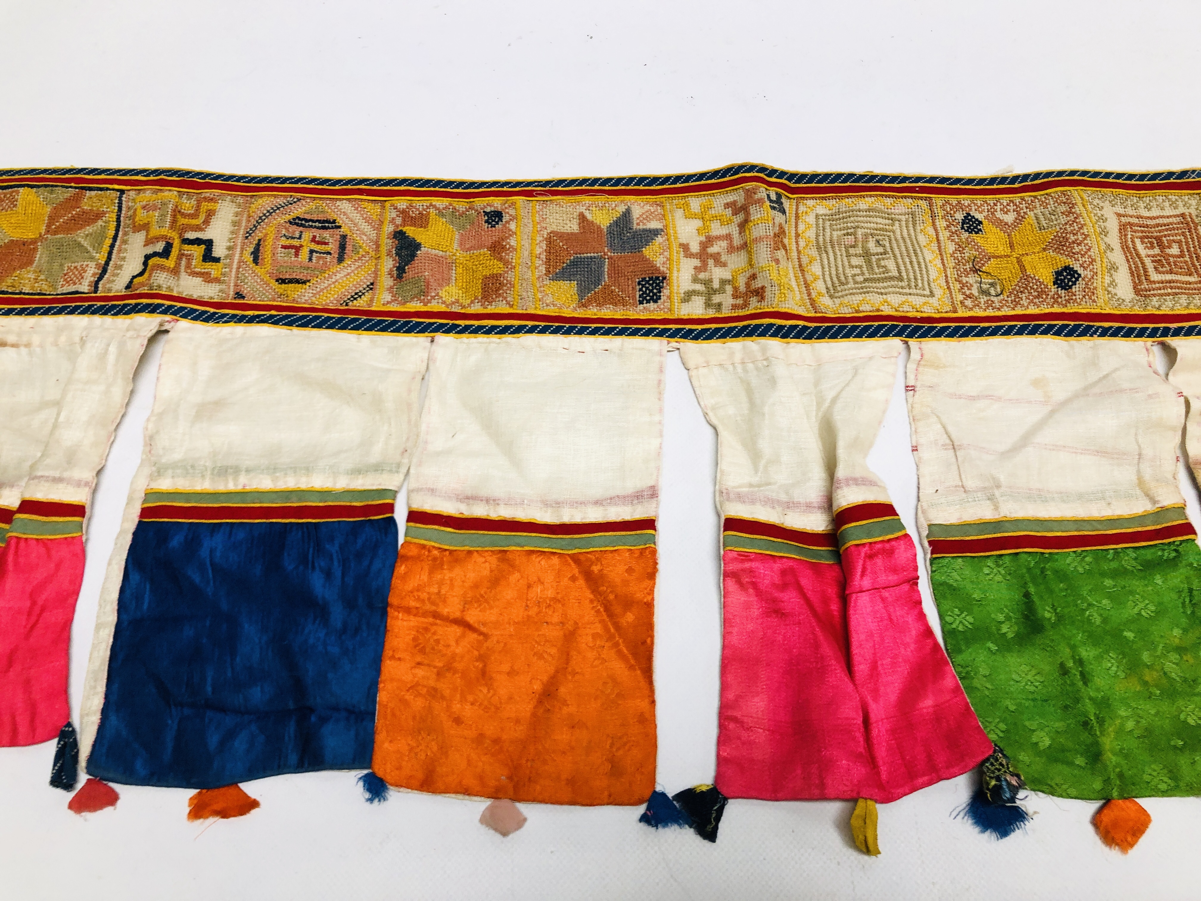 A HANDMADE ETHNIC TRIBAL SILK AND EMBROIDERED DOOR / WINDOW HANGING. - Image 3 of 5