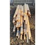 21 BUNDLES OF ASSORTED TIMBER.