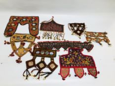 A COLLECTION OF EASTERN AND ASIAN TRIBAL ART FACE MASKS TO INCLUDE SHISHA AND NEEDLEWORK EXAMPLES.