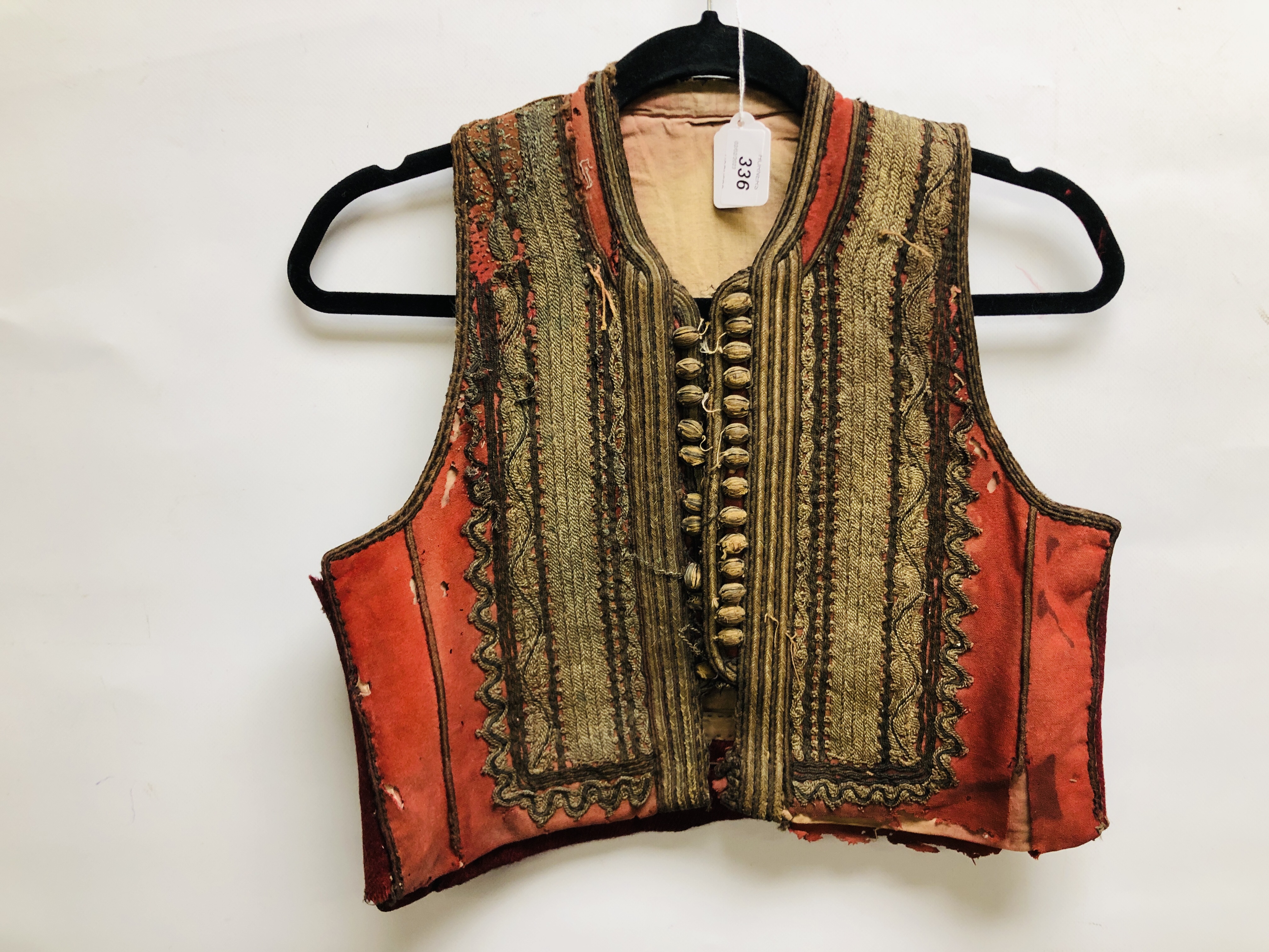 A VINTAGE MIDDLE EASTERN HANDMADE CHILDS WAISTCOAT WOVEN WITH ELABORATE GILT THREAD (REQUIRES