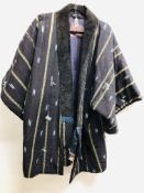 A VINTAGE AFGHAN WOVEN COAT WITH A BLACK VELVET COLLAR