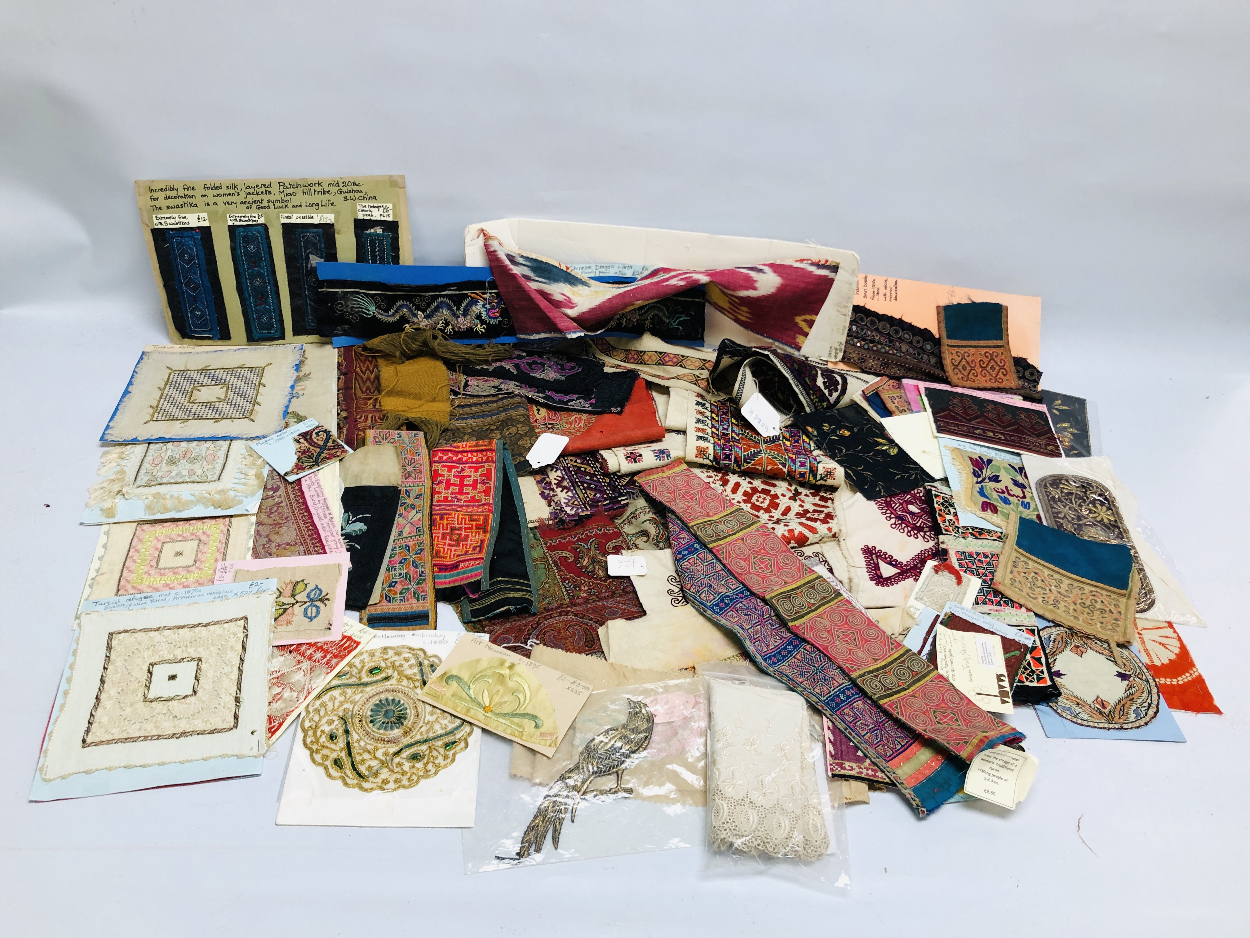 TWO BOXES CONTAINING AN EXTENSIVE COLLECTION OF TEXTILES EXAMPLES.