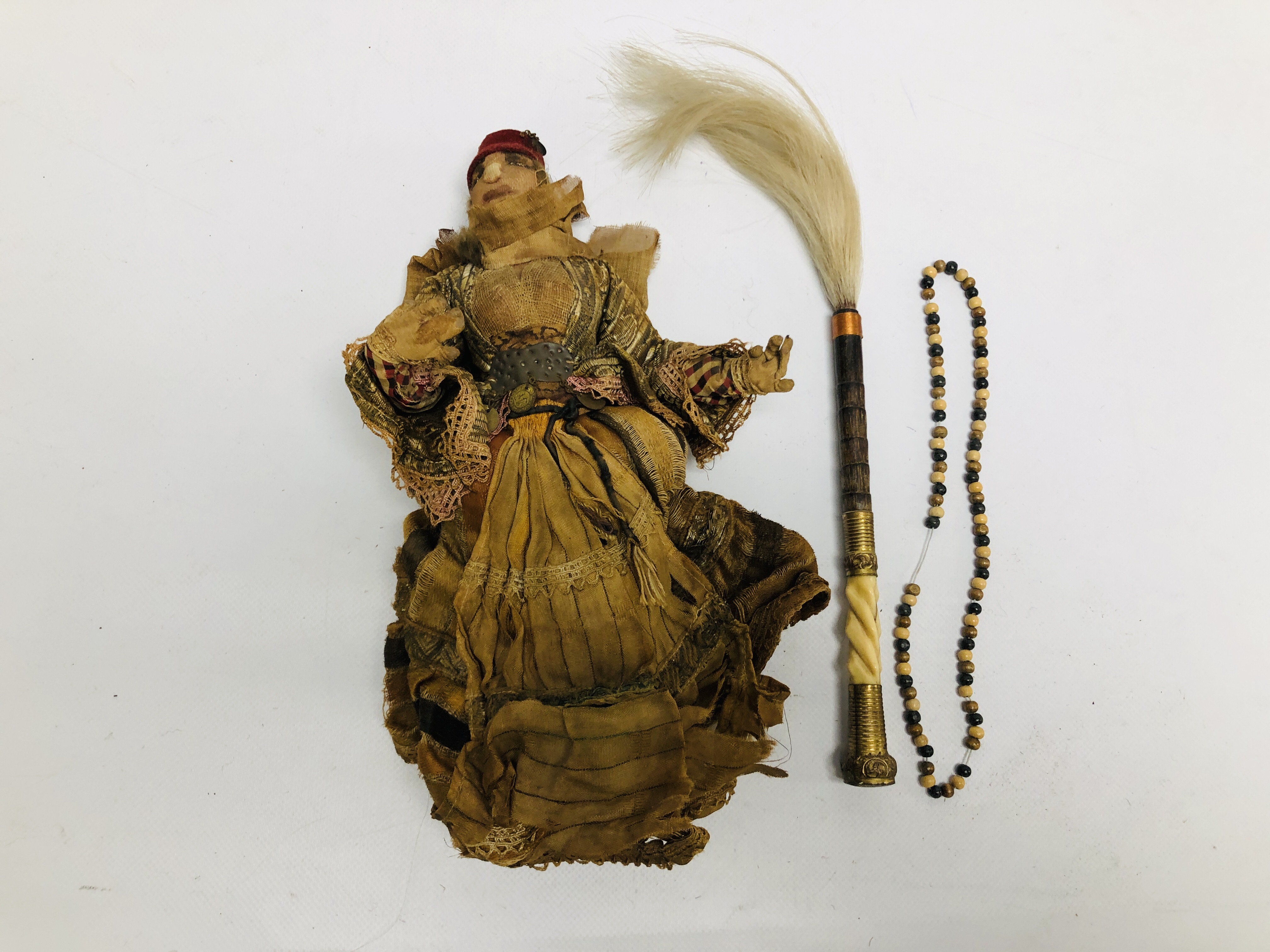 A VINTAGE AFGHAN HANDMADE DOLL, WEARING TRADITIONAL DRESS,