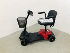 A DRIVE DEVILBISS FOLDING MOBILITY SCOOTER WITH MANUAL AND CHARGER - SOLD AS SEEN.