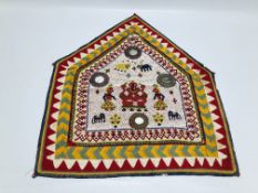 AN INDIAN BEADED WALL HANGING DECORATED WITH SHISHA AND PATCHWORK DETAIL W 53CM. X H 64CM.
