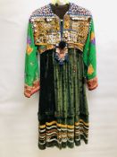 A VINTAGE AFGHAN KUCHI STYLE TRIBAL DRESS DECORATED WITH ELABORATE EMBROIDERY INTRICATE BEADWORK,