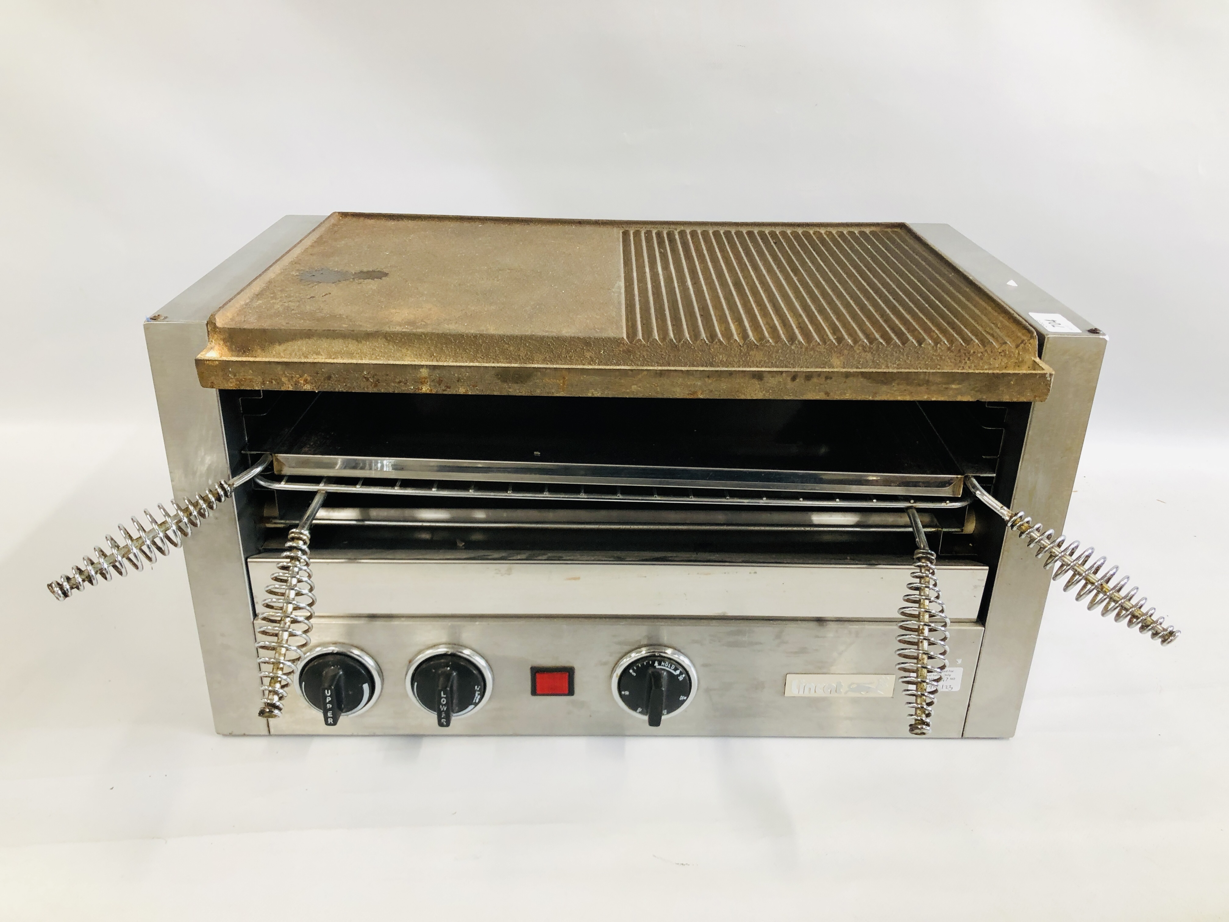 A LINCAT ELECTRIC STAINLESS STEEL GRIDDLE WITH CAST TOP MODEL QG6 - SOLD AS SEEN