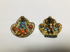 TWO ELABORATE EASTERN STYLE GILDED BROOCHES DEPICTING GODDESS, INSET WITH COLOURED STONES.