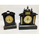 TWO VINTAGE BLACK LACQUERED MANTEL CLOCKS, ONE HAVING COLUMN DETAIL.