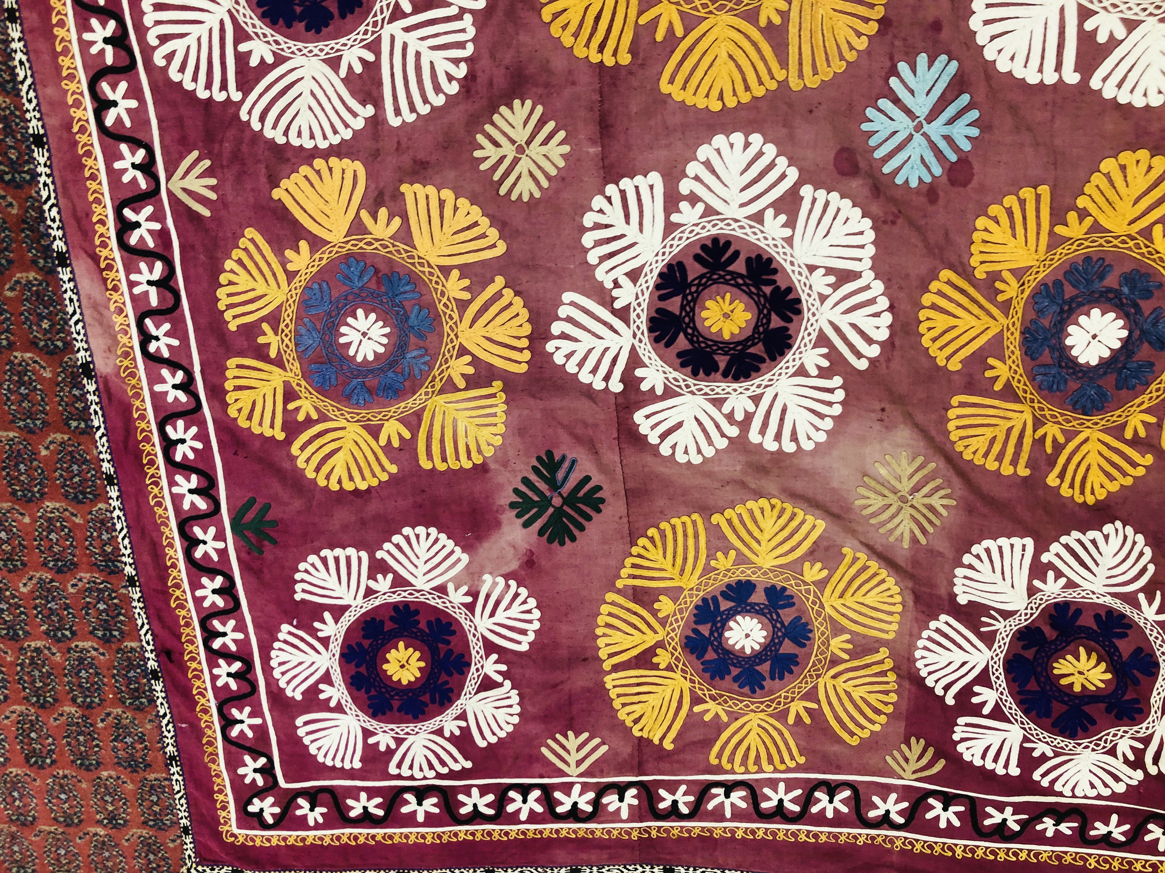 A SUZANI THE CHAIN STITCH EMBROIDERY ON PLUM SILK C19TH, L 242CM X W 166CM. - Image 8 of 12