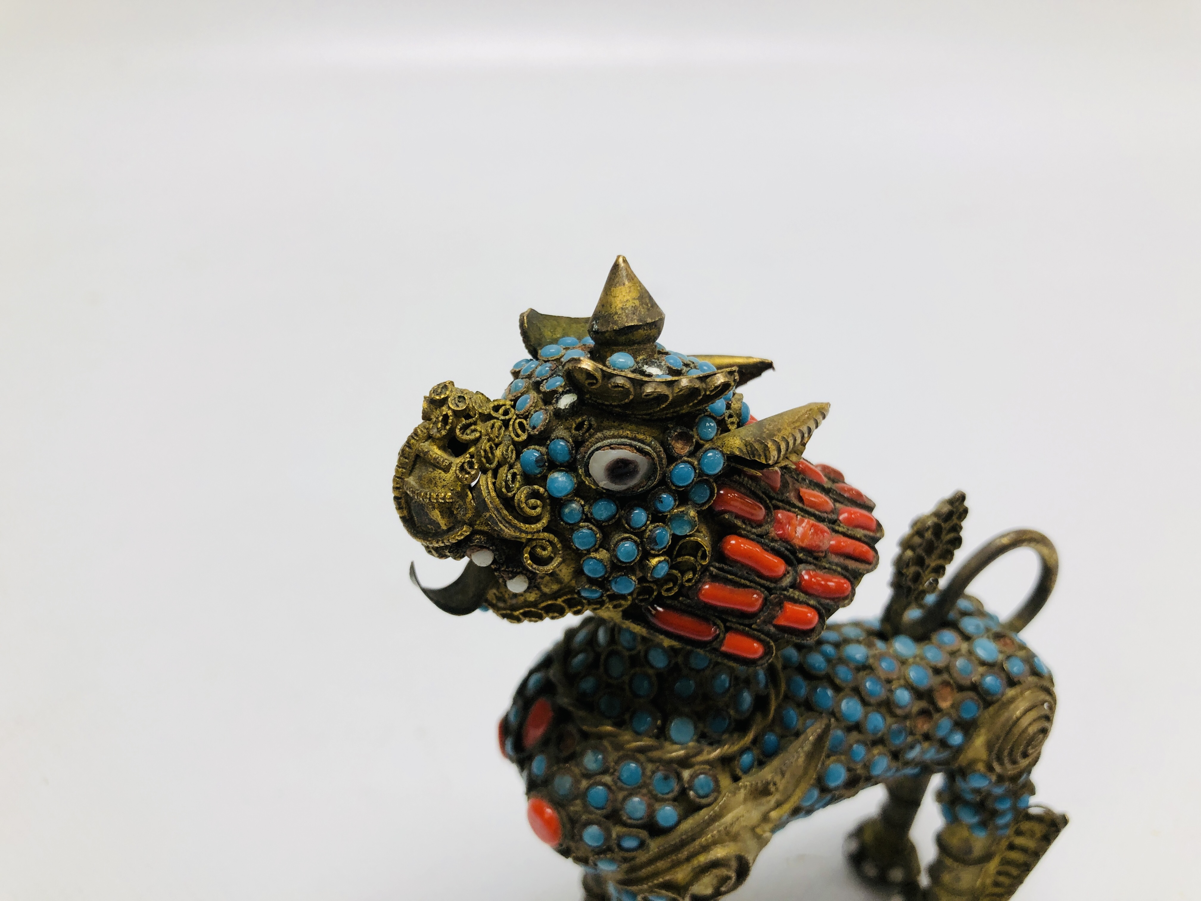 A VINTAGE TIBETAN STYLE PERFUME BOTTLE IN THE FORM OF A FOO DOG INSET WITH COLOURED STONES, - Image 2 of 9