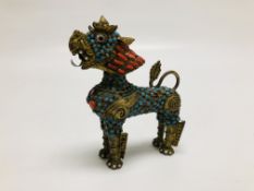 A VINTAGE TIBETAN STYLE PERFUME BOTTLE IN THE FORM OF A FOO DOG INSET WITH COLOURED STONES,