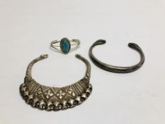 TWO EASTERN TRIBAL STYLE WHITE METAL CUFF / CHOKER NECKLACES OF VARIOUS DESIGNS.