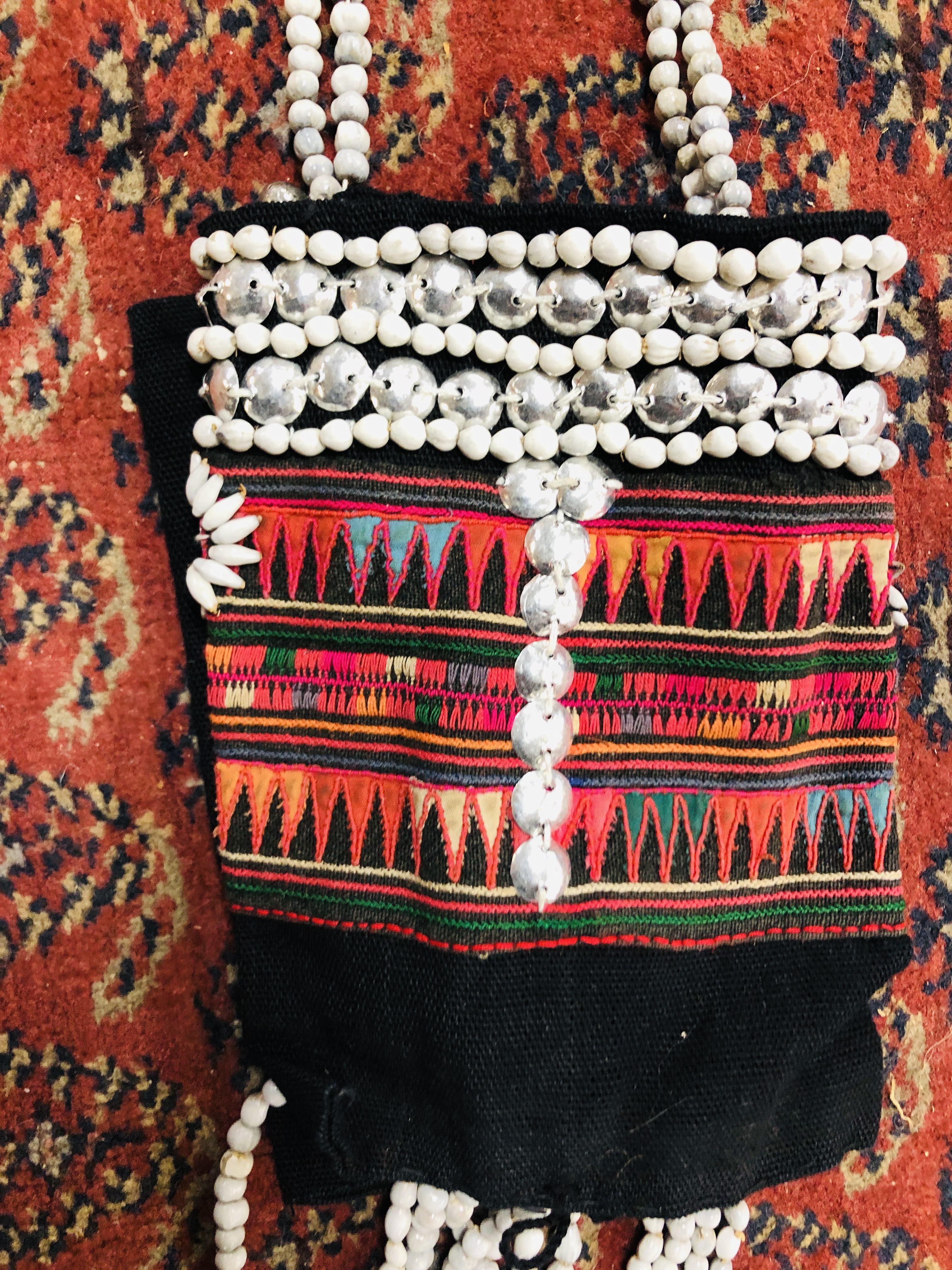 A GROUP OF ETHNIC TRIBAL TEXTILES TO INCLUDE A CLOTH / COVER DECORATED WITH "COWRIE" SHELL APPLIED - Image 6 of 15