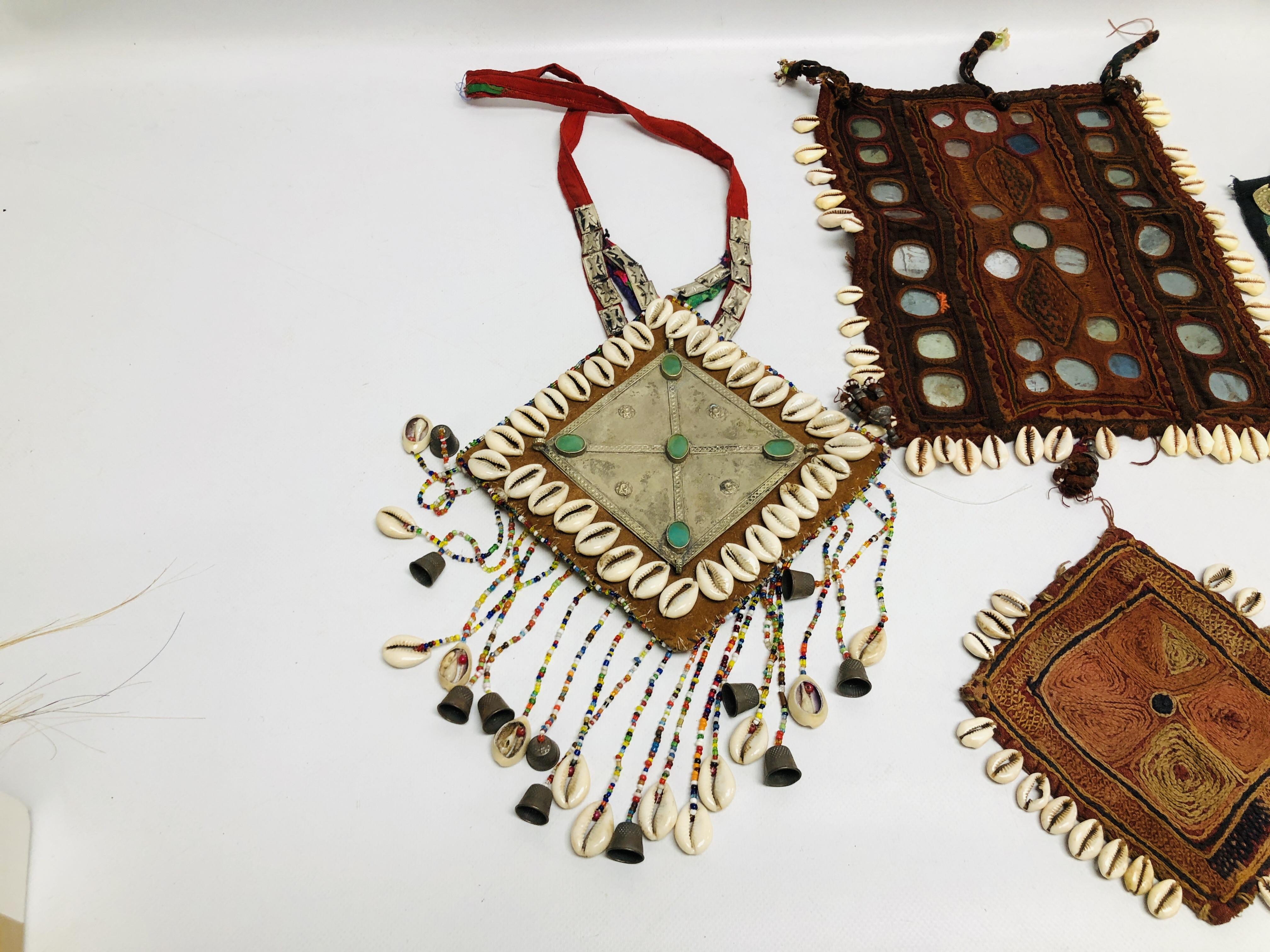 A GROUP OF FIVE VARIOUS AFGHAN TEXTILE PIECES APPLIED WITH COWRIE SHELLS AND OTHER DECORATION - Image 3 of 10