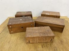 A GROUP OF FIVE HARDWOOD TREASURY BOXES.