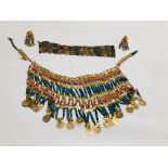 AN EGYPTIAN STYLE JEWELLERY SET COMPRISING OF A CUFF BRACELET, CLIP EARRINGS AND FACE COVERING,