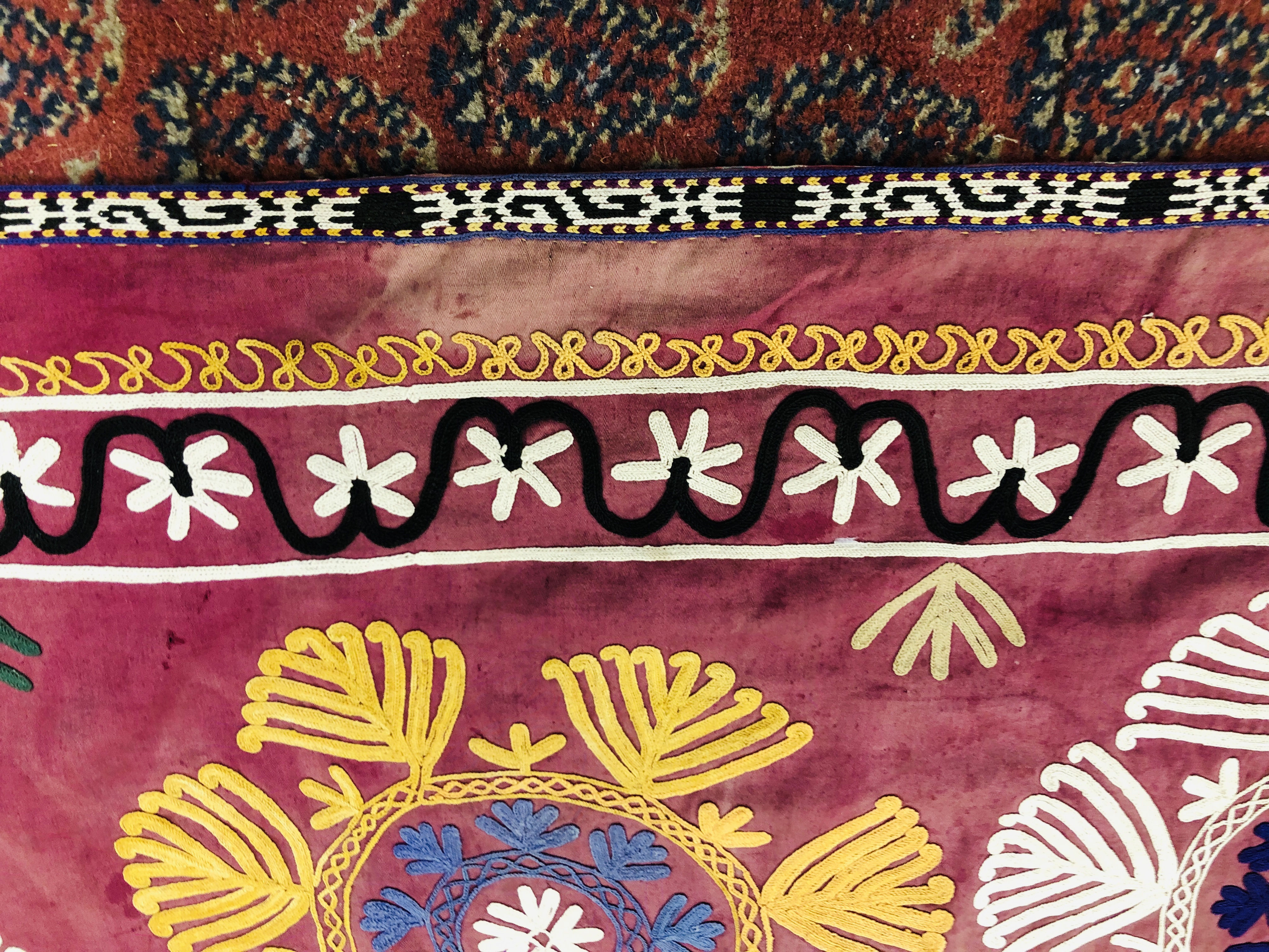 A SUZANI THE CHAIN STITCH EMBROIDERY ON PLUM SILK C19TH, L 242CM X W 166CM. - Image 9 of 12