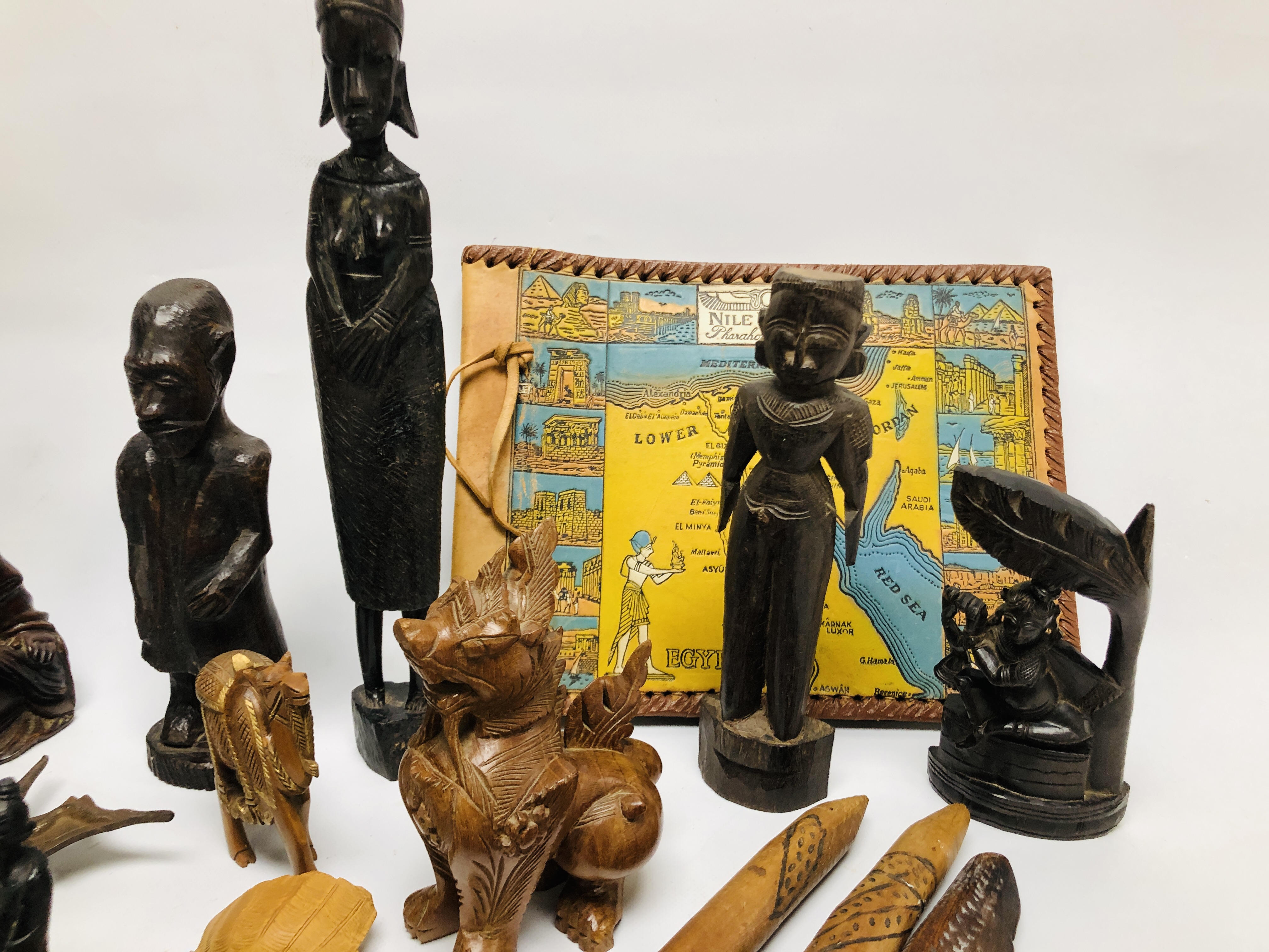 A BOX OF ASSORTED MAINLY HARDWOOD ETHNIC ARTIFACTS COMPRISING OF VARIOUS CARVED FIGURES AND OBJECTS. - Image 3 of 7