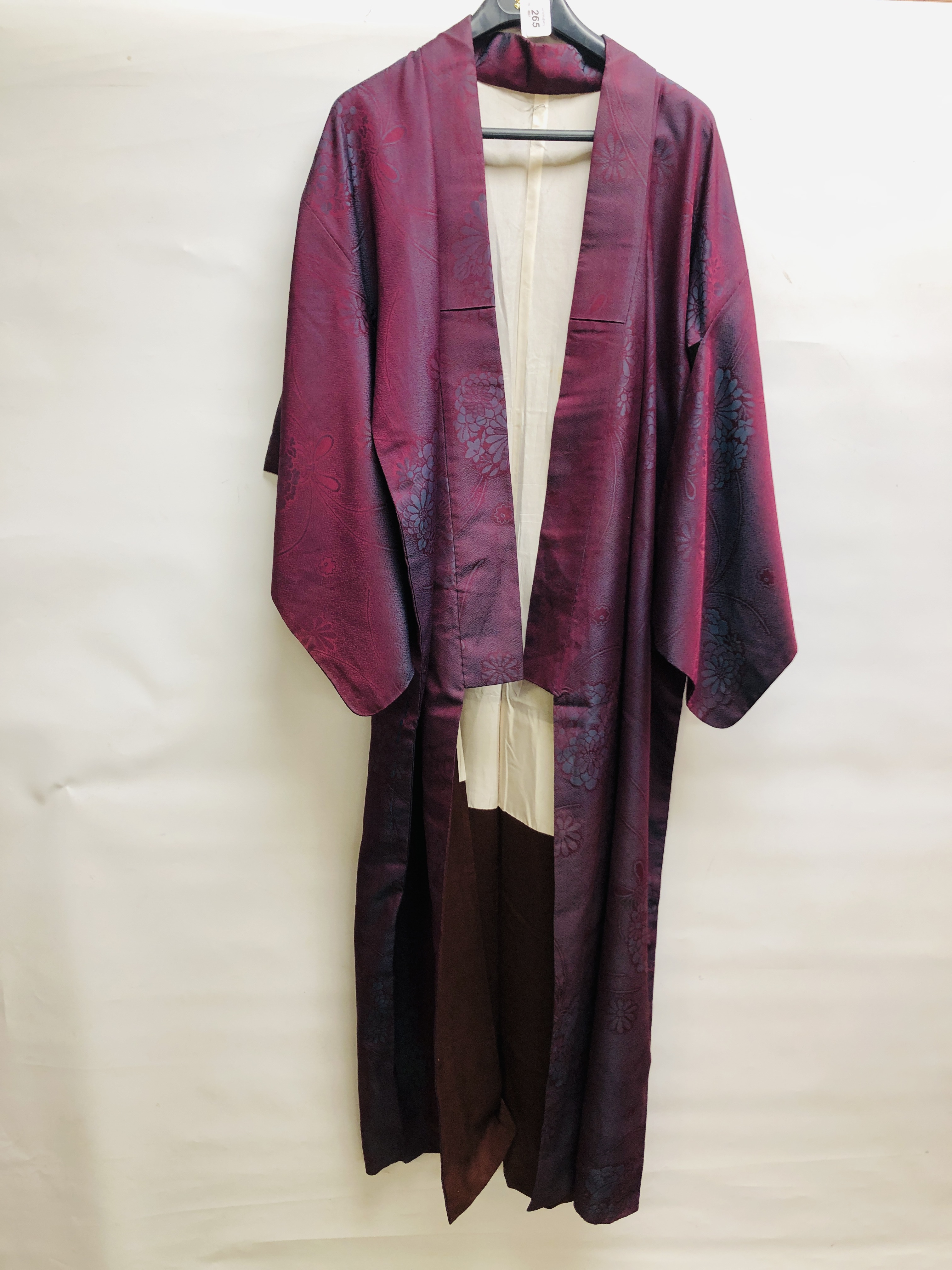 A JAPANESE PURPLE SILK KIMONO