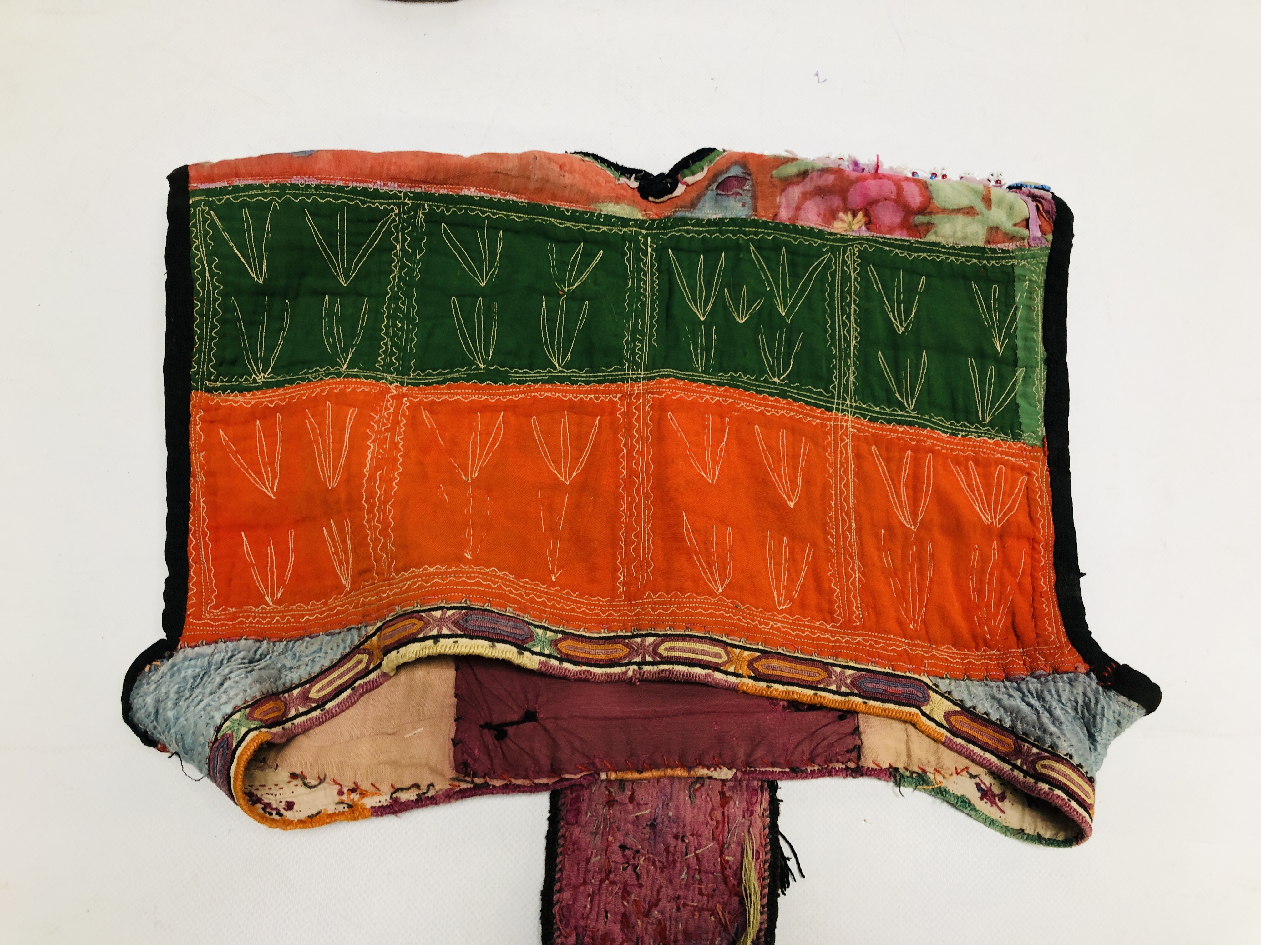 A GROUP OF 5 ASIAN TRIBAL TEXTILE GARMENTS TO INCLUDE SUZANI EXAMPLES. - Image 8 of 9