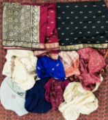 A GROUP OF 8 INDIAN STYLE WRAP SAREES TO INCLUDE SILK AND HAND CRAFTED EXAMPLES.