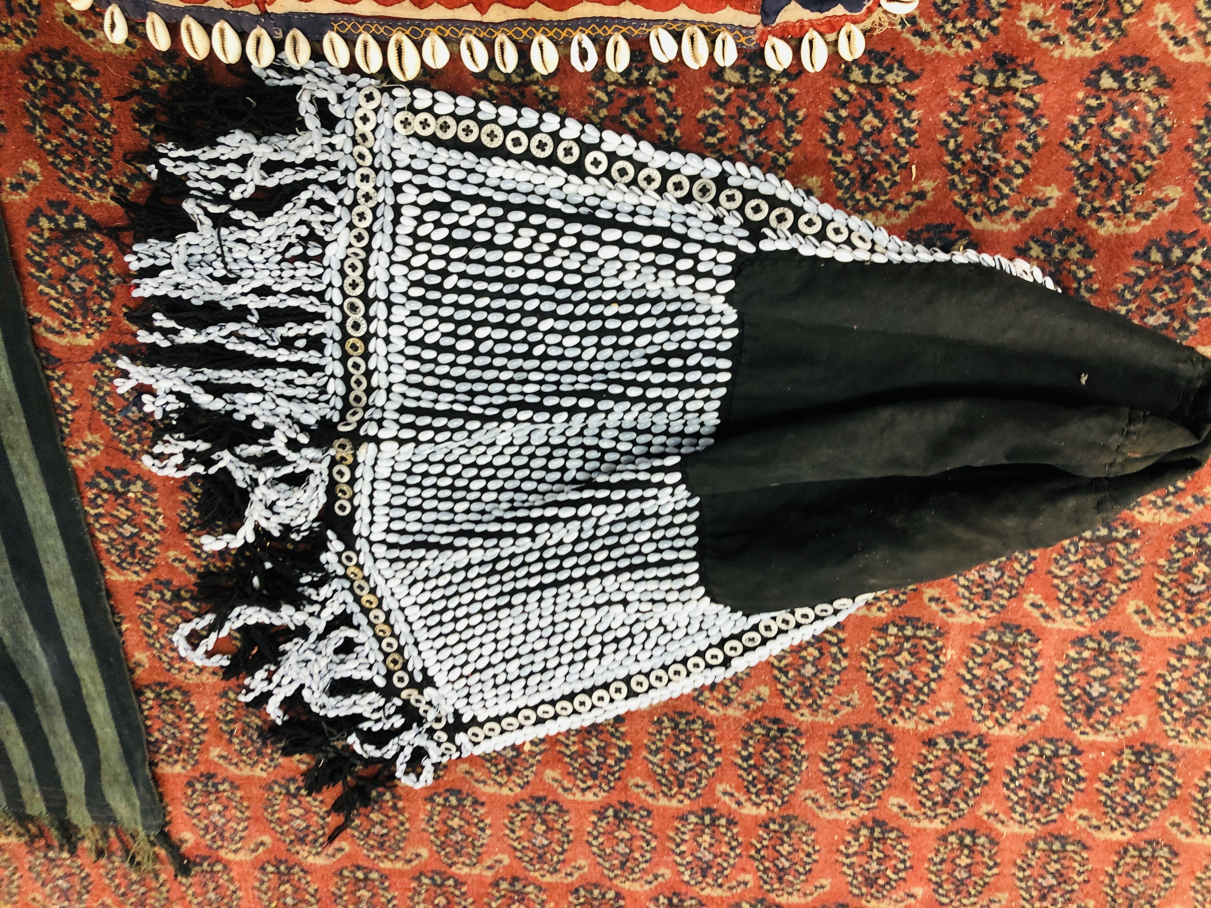 A GROUP OF ETHNIC TRIBAL TEXTILES TO INCLUDE A CLOTH / COVER DECORATED WITH "COWRIE" SHELL APPLIED - Image 12 of 15