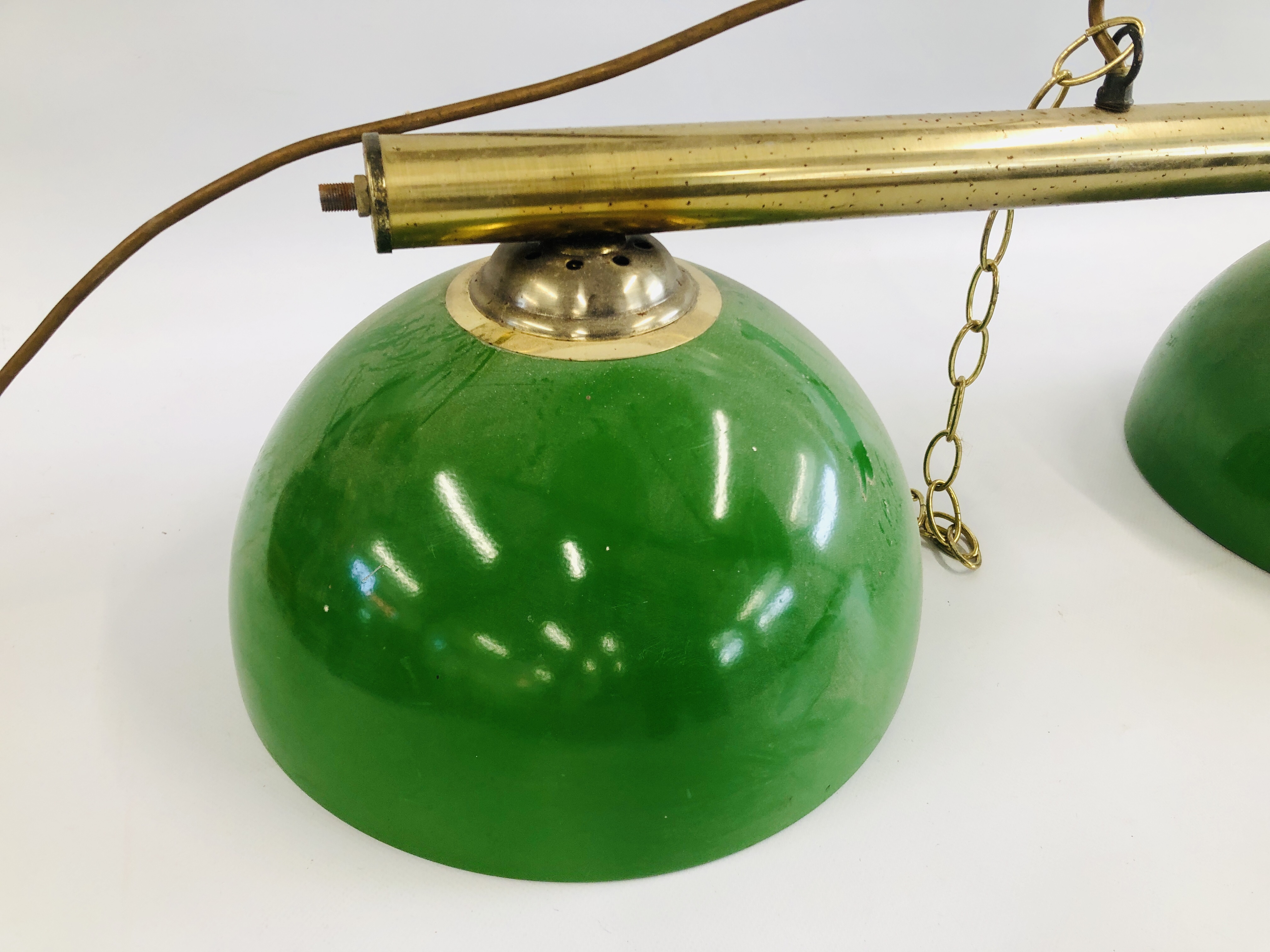 A VINTAGE STYLE CEILING SUSPENDED THREE BULB LIGHT BAR ON BRASS EFFECT TUBE AND GREEN SHADES - SOLD - Image 5 of 5