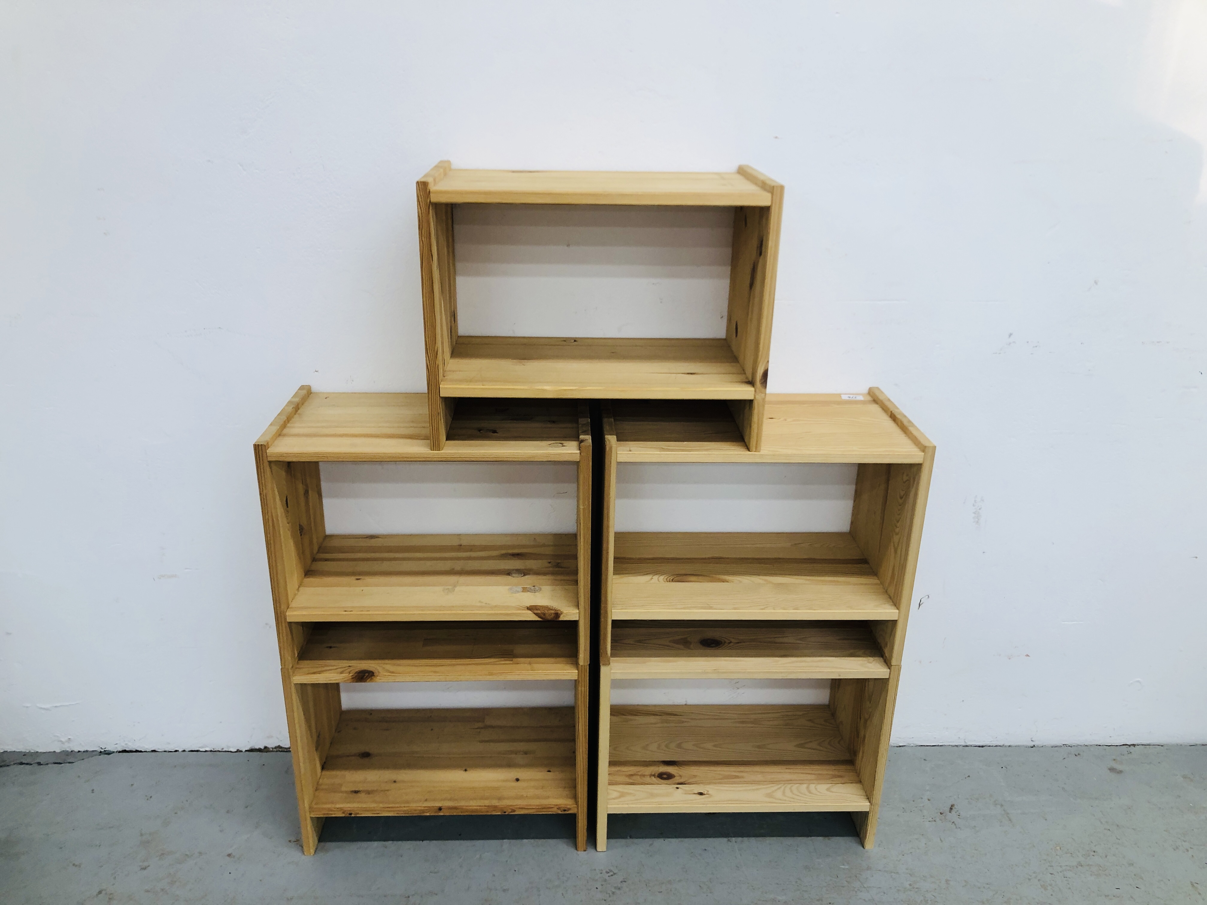 A GROUP OF PINE OPEN BACK STORAGE SHELVES - W 52CM. X D 30CM. X H 40CM.